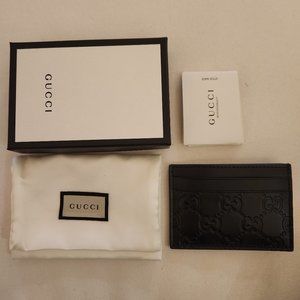 Gucci GG Embossed Leather Mens Money Clip